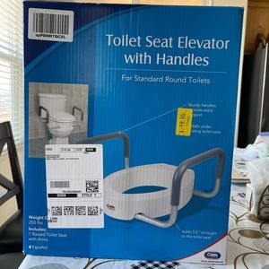 Toilet riser with handles